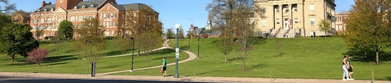 View of Arts & Sciences Hall (left) and Van Wormer Hall (right) from across the street.